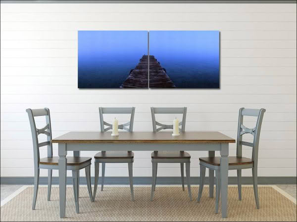 Framed photo artwork of jetty in mist by Richard Hume on wall in living room, Lake Tarawera, New Zealand