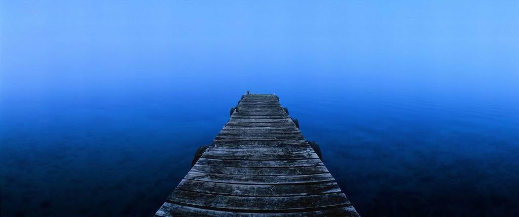 New Zealand Landscape Photography Misty Morning. A jetty and misty Lake Tarawera, New Zealand.