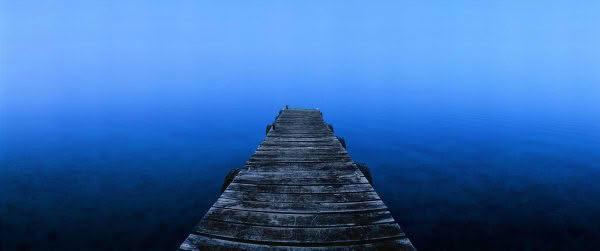 New Zealand Landscape Photography Misty Morning. A jetty and misty Lake Tarawera, New Zealand.