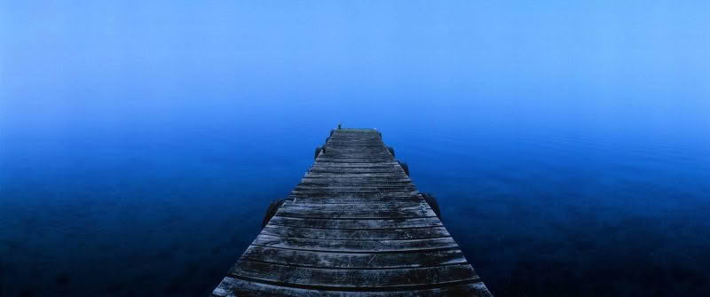 New Zealand Landscape Photography Misty Morning. A jetty and misty Lake Tarawera, New Zealand.