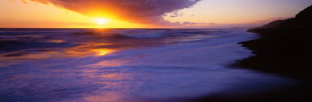 New Zealand Landscape Photography Wild Mahia Dusk A vast seascape with setting sun and coastline at Mahia Peninsula, New Zealand.