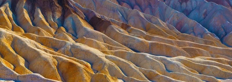 Zabriskie Point. Colorful cliffs filling whole frame at Death Valley, USA