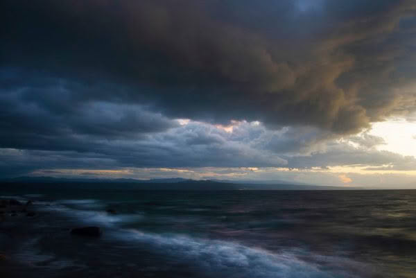 New Zealand Landscape Photography Taupo Moods. Stormy and dramatic clouds over Lake Taupo.