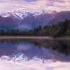 Lake Matheson on the West Coast of the South Island. Mt Cook reflected in the dawn light
