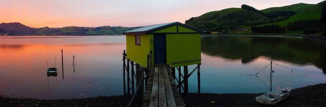 Quiet Morning. Boat shed at sunrise, Otago Peninsula, New Zealand