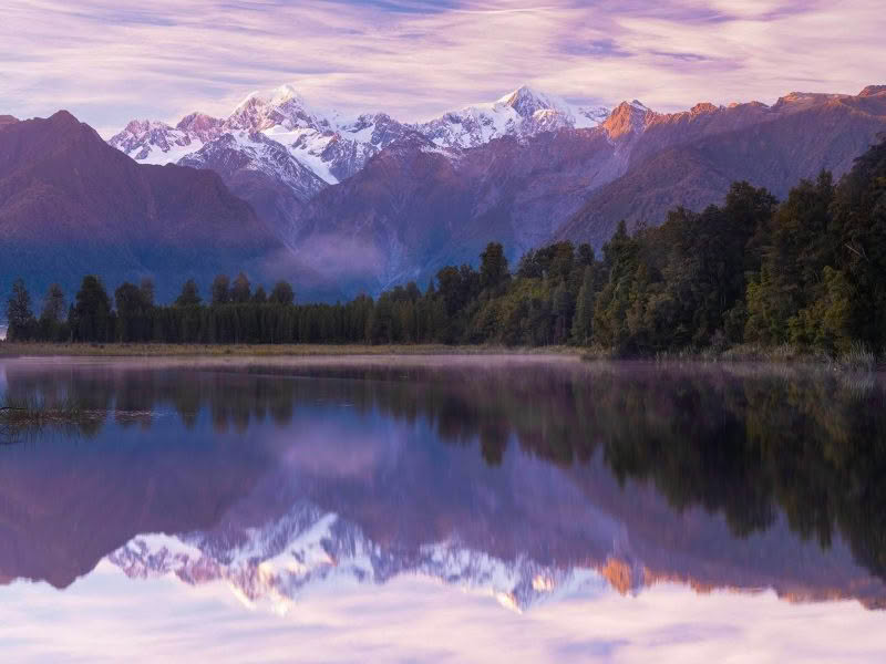 Lake Matheson, New Zealand - mirrored reflection of mountains captured in a fine art landscape photograph by Richard Hume