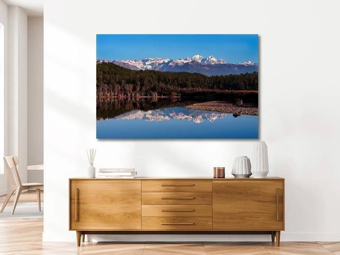 Landscape photograph of Three Mile Lagoon on New Zealand’s West Coast displayed on a wall in a home