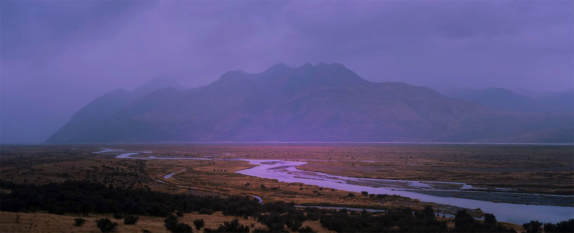 Tasman River winding through the Tasman Valley at dusk