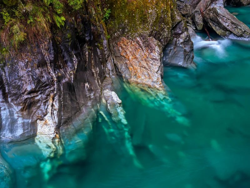 Turquoise water and submerged rock formations at Blue Pools, Haast Pass, New Zealand