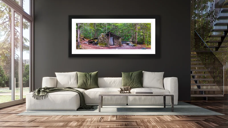Sam Summers Hut panoramic fine art photography print displayed on the wall of a contemporary living room.