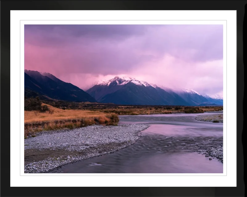 Tasman Valley Glow fine art landscape print presented in a black frame.